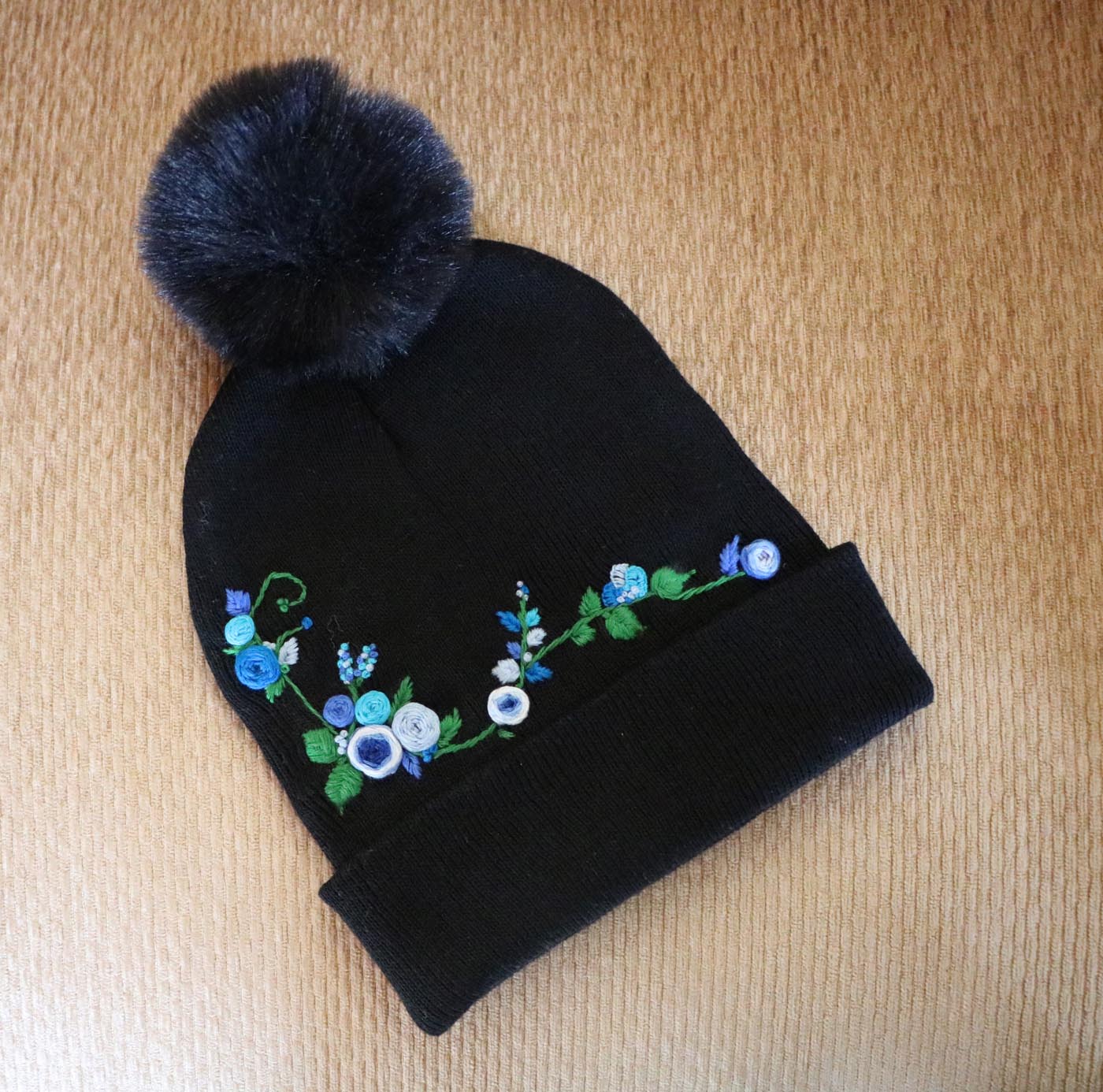 Hand-Embroidered Black Beanie with Pom Pom — Blue Flowers — photo 1