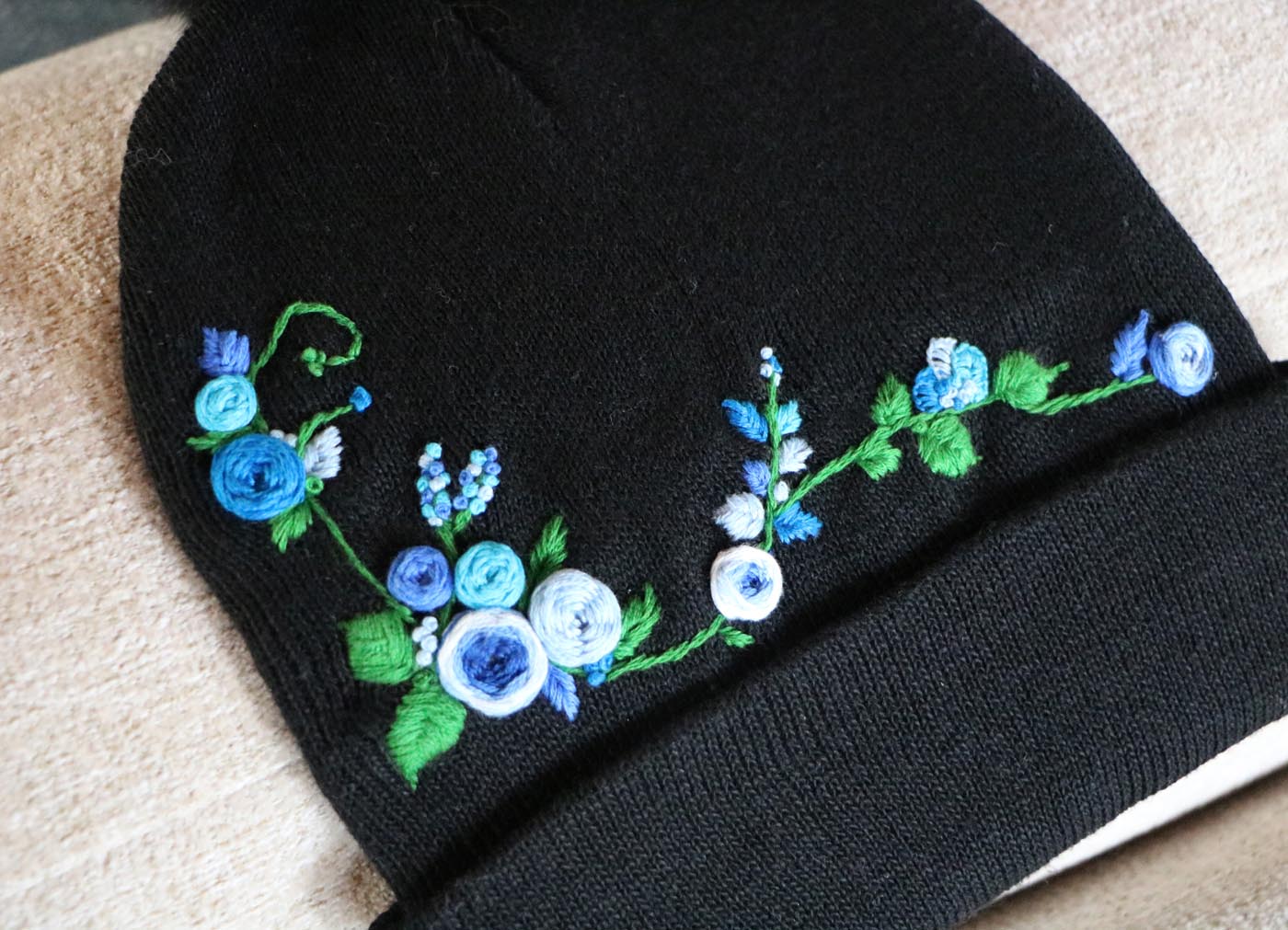 Hand-Embroidered Black Beanie with Pom Pom — Blue Flowers — photo 3