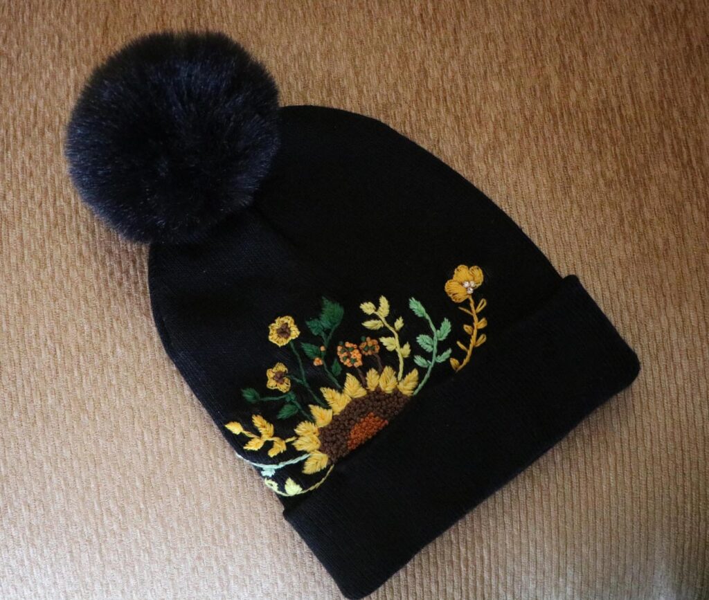Hand-Embroidered Black Beanie with Pom Pom — Sunflower — photo 1