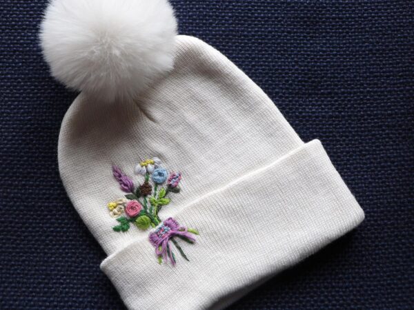 Hand-Embroidered White Beanie with Pom Pom — Flower Bouquet — photo 1