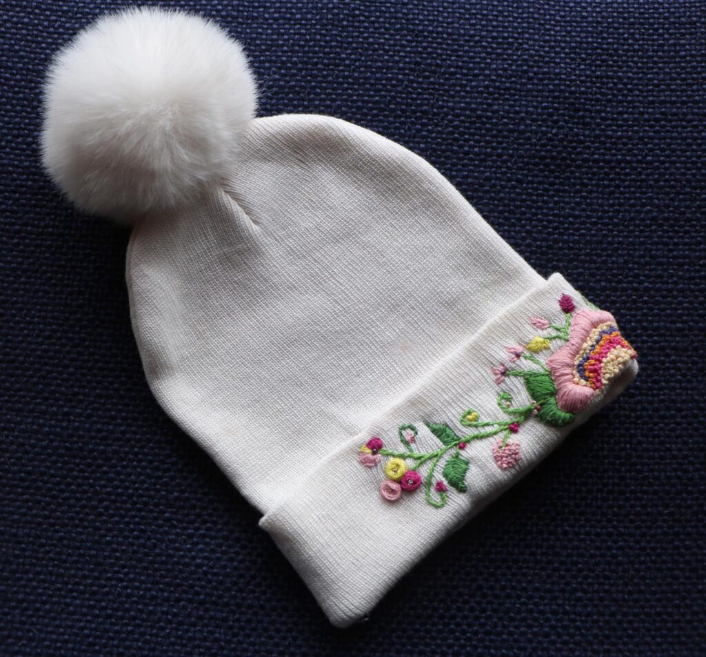 Hand-Embroidered White Beanie with Pom Pom — Pink Flower — photo 1