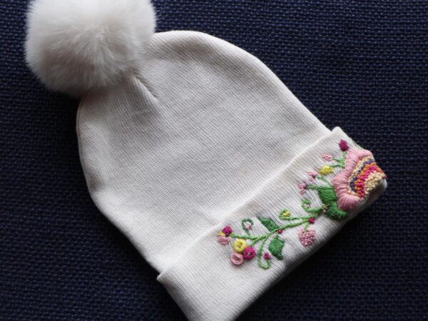 Hand-Embroidered White Beanie with Pom Pom — Pink Flower — photo 1