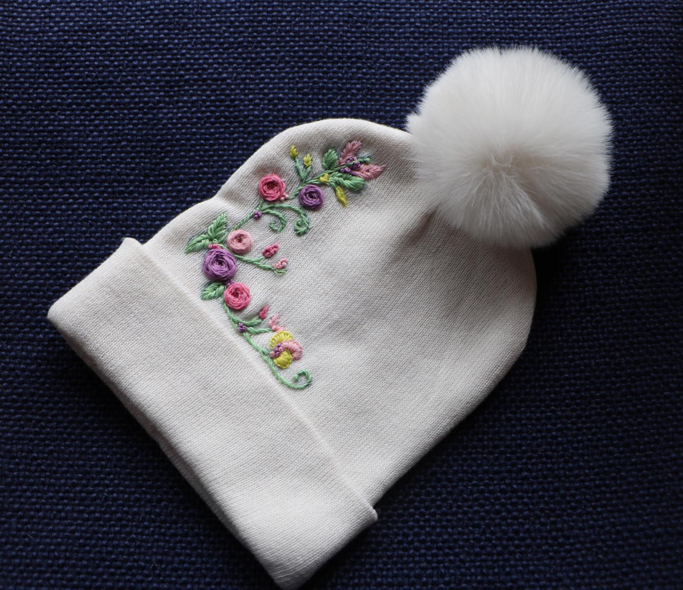 Hand-Embroidered White Beanie with Pom Pom — Pink & Purple Flowers — photo 1
