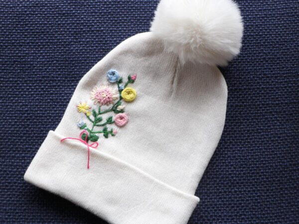 Hand-Embroidered White Beanie with Pom Pom — Pink Yellow Blue Flowers — photo 1